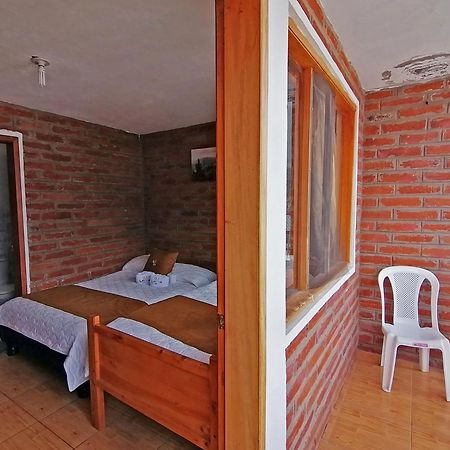 Lagoon Hotel Chugchilan Bagian luar foto